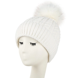 Chunky cable knit beanie for women in cream white with large faux fur pompom detail