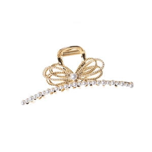 Elegant gold metal sunflower hair claw clip with white pearl accents on white background