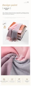 Detail view of plaid cashmere scarf showing soft texture and fine fringe edge details