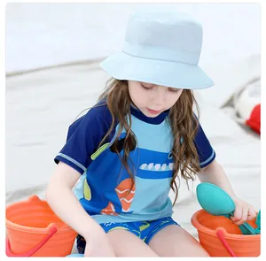 Kids quick-dry dinosaur swimwear set with UV protection sun hat for beach activities