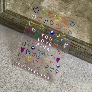 Minimalist ultra-thin nail stickers with colorful heart patterns and smile face designs