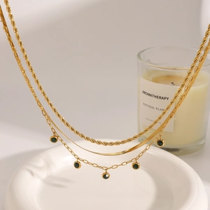 Three-layer 18K gold plated stainless steel necklace with green gemstone charms and snake chain