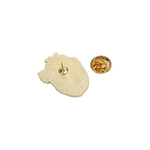 Detailed back view of the heart-shaped gold alloy brooch showing pin and butterfly clutch