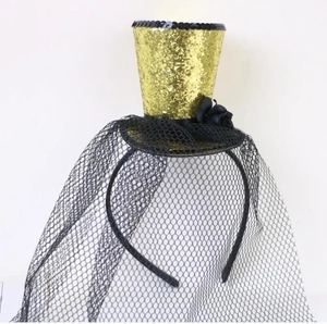 Detail of gold sequin mini hat headband with black mesh veil for Halloween party decor