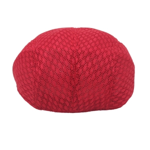 Detailed view of red floral lace fabric texture on a mesh ivy cap for women