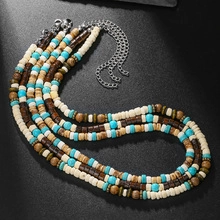 Detail showing multi-layer beaded necklaces in brown and turquoise with silver lobster clasp