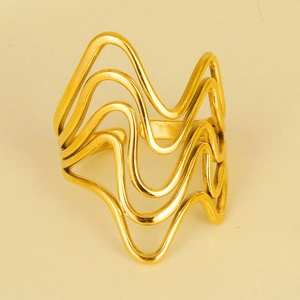 Macro shot of minimalist wavy 18k gold plated stainless steel open ring with layers