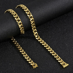 Classic 10mm golden Cuban link chain necklaces in stainless steel on black background