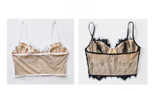 Detail of white and black lace bralettes with eyelash trim and adjustable straps