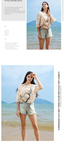 Detail of woven straw crossbody bag with ethnic style wide strap on beach background