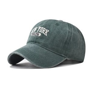 Detailed close-up of New York 1625 embroidery on washed cotton canvas baseball cap