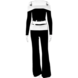Detail of contrast stitch off-shoulder long sleeve top and flared trousers on mannequin