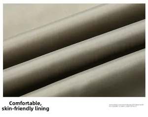 Macro detail of breathable khaki fabric lining showing soft texture and premium material