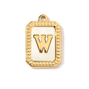 Close-up of golden rectangular pendant with a white shell base and uppercase letter W