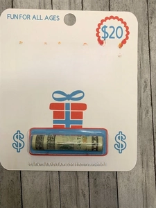 Detail of white birthday money holder card with plastic slot for real cash display