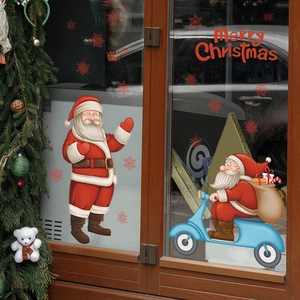 Detail of Santa Claus on blue scooter window decals with Merry Christmas stickers