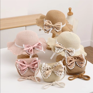Kids straw hat and bag set with floral bows and lace trim for summer sun protection