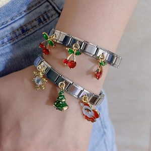 Italian charm bracelets with cherry and Christmas holiday charms on model wrist