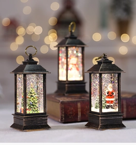 Macro shot of bronze Christmas lanterns with warm lights and rotating sequins inside