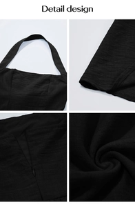Detail design showing halter neck, textured fabric, and back invisible zipper of black maxi dress
