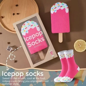 Creative strawberry popsicle style socks in pink with gift box and summer props