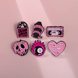 Set of 6 gothic enamel pins featuring skull radio, record player and dark heart designs