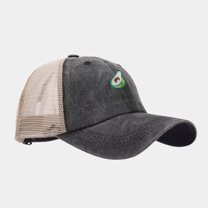 Detail of grey washed cotton trucker hat with avocado embroidery and beige mesh back