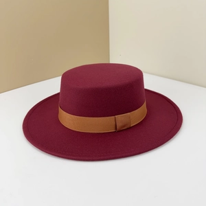 Classic burgundy wool flat top felt hat with elegant brown decorative ribbon band