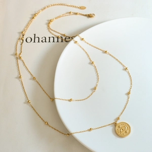 French vintage layered satellite chain with evil eye coin pendant in 18k gold finish
