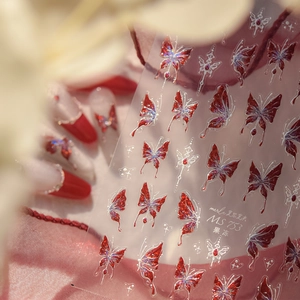 Detail of MS 753 3D butterfly nail stickers with red and white shimmer finish