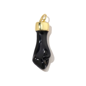 Detail of black enamel Figa hand pendant with gold-plated metal cap and ring
