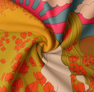 Close-up of vibrant bohemian tapestry texture with floral print and sunburst patterns