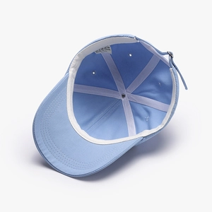 Light blue cotton baseball cap showing internal stitching, sweatband and quality details