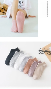 Detail of multi-color cotton ankle socks featuring high-elastic ribbed cuffs and soft texture