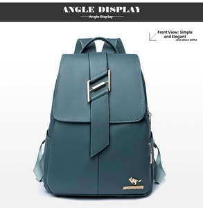 Detail of green lychee leather backpack with golden kangaroo logo and metal hardware