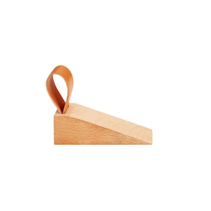 Minimalist wooden door stopper wedge with brown leather loop strap on white background