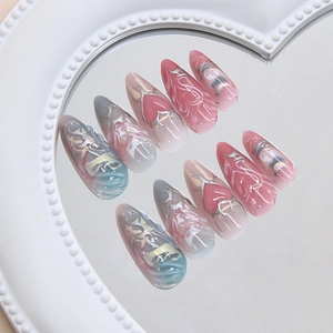 Cyber-Y2K press on nails with 3D silver hearts and gradient colors on heart mirror