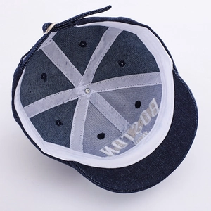 Detail view of denim baby baseball cap interior showing white sweatband and Boston stitching