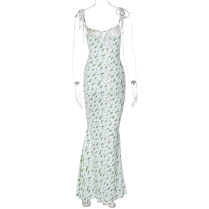 Detailed back view of a white floral sundress featuring a low back and fishtail hemline