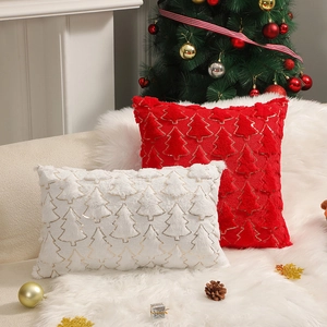 Christmas plush pillows with gold embroidered trees on red and white fabrics