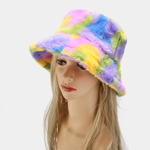 Detail showing plush faux fur texture and multi-color patchwork design on winter bucket hat