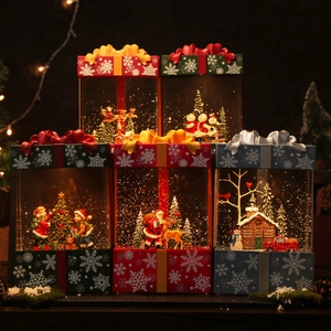 Christmas gift box snow globe lantern with Santa and snowman scenes and warm LED lighting