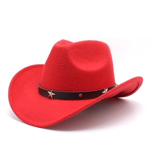 Detail of red cowboy hat featuring black leather band and silver metal star studs