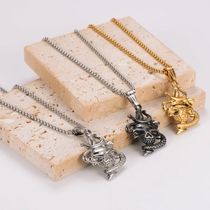 Gothic stainless steel skull and snake pendant necklace set in silver, black, and gold