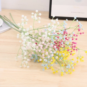 Close-up of colorful artificial baby's breath bouquet with realistic plastic flower textures