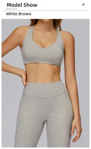 Close-up of a two-piece workout set in light brown grey with racerback sports bra and leggings