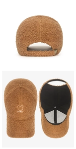 Close-up of brown teddy fleece baseball cap with teddy bear embroidery and inner lining