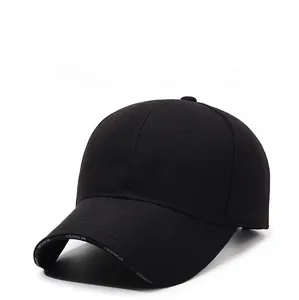Detail of 3D BLACK letter embroidery and FASHION print on a black cotton baseball cap