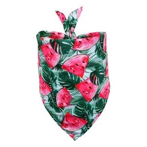 Detailed view of the summer pet bandana showing watermelon and tropical leaf prints