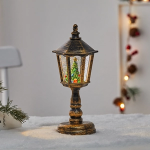 Lanterne de Noël vintage en bronze avec éclairage LED et effet de neige tourbillonnante
